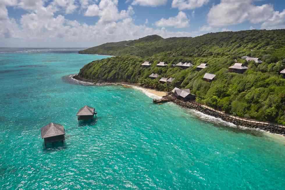  This Caribbean Resort Has 2 New Gorgeous Overwater Bungalows for a Dreamy Spa Expertise